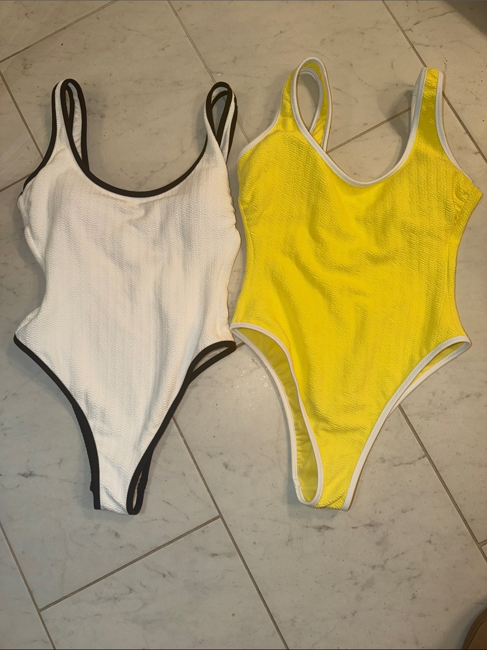 No Boundaries White One-Piece with Black Trim & Yellow One-Piece with White Trim